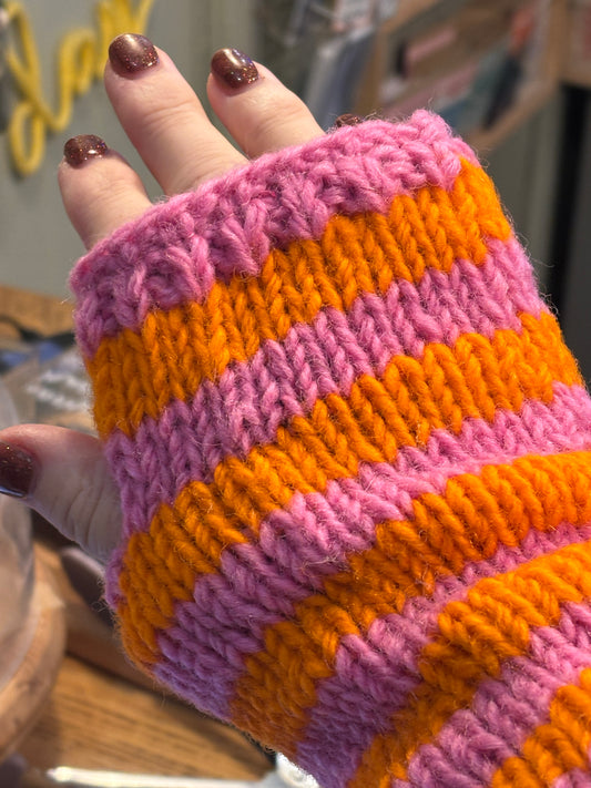 knitted fingerless gloves in bright pink and orange chevron stripe hand warmer, winter accessory, colorful boho mittens