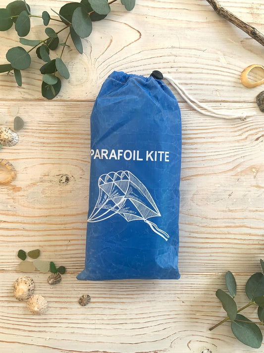 parafoil kite portable compact blue drawstring storage bag lightweight outdoor flying toy beach park travel-friendly kite