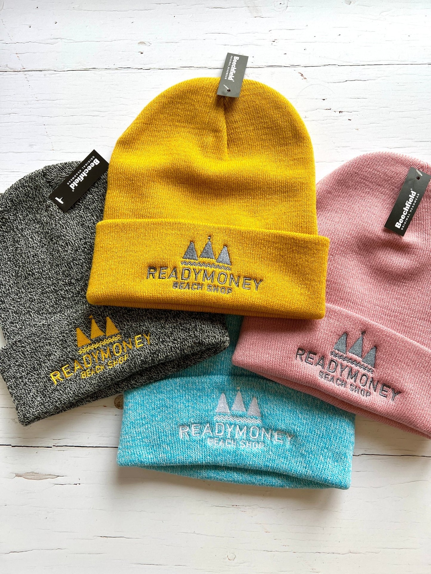 colorful Readymoney Beach Shop beanie hats, cosy embroidered knit winter beanies in mustard, pink, grey and teal