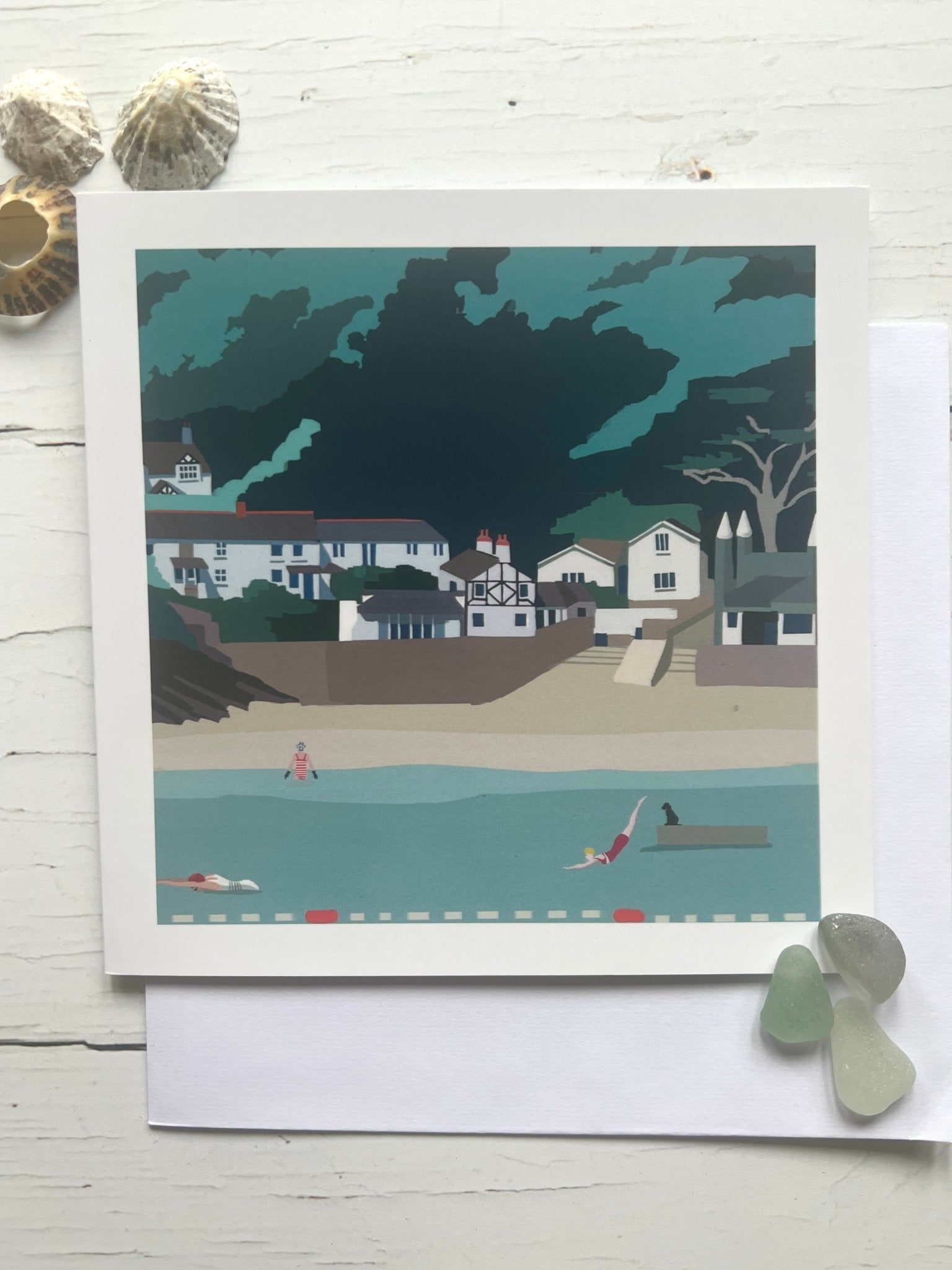 Readymoney Cove greetings card—playful coastal illustration with swimmers, dog, and beach charm for seaside gifting