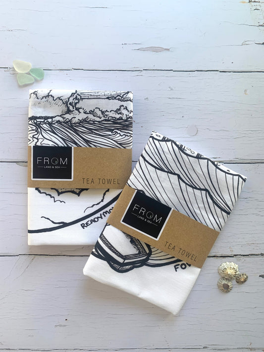 Town Quay tea towels—black and white coastal illustrations of Fowey and Readymoney Cove, perfect for nautical kitchen decor