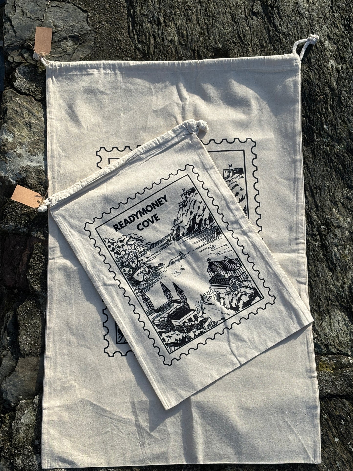 Readymoney Cove stamp cotton bags - small & large natural drawstring pouches with Cornwall beach scenic design