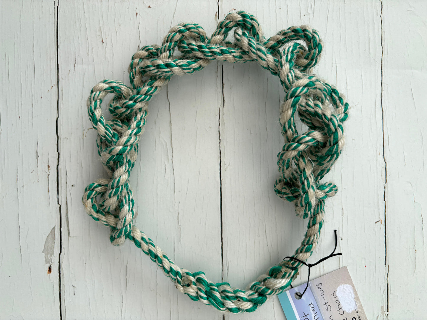 sustainable knotted dog toy hoop made from upcycled green/cream fishing rope tough, eco-friendly fetch ring, seaside pet gift