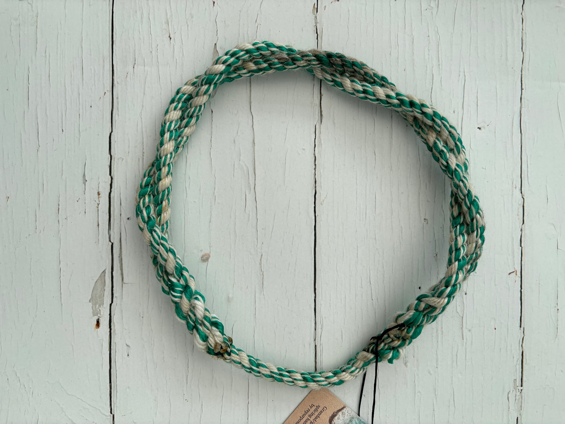 eco-friendly 'Hurler Hoop' dog toy made from recycled green/cream fishing rope durable, nautical, sustainable pet accessory