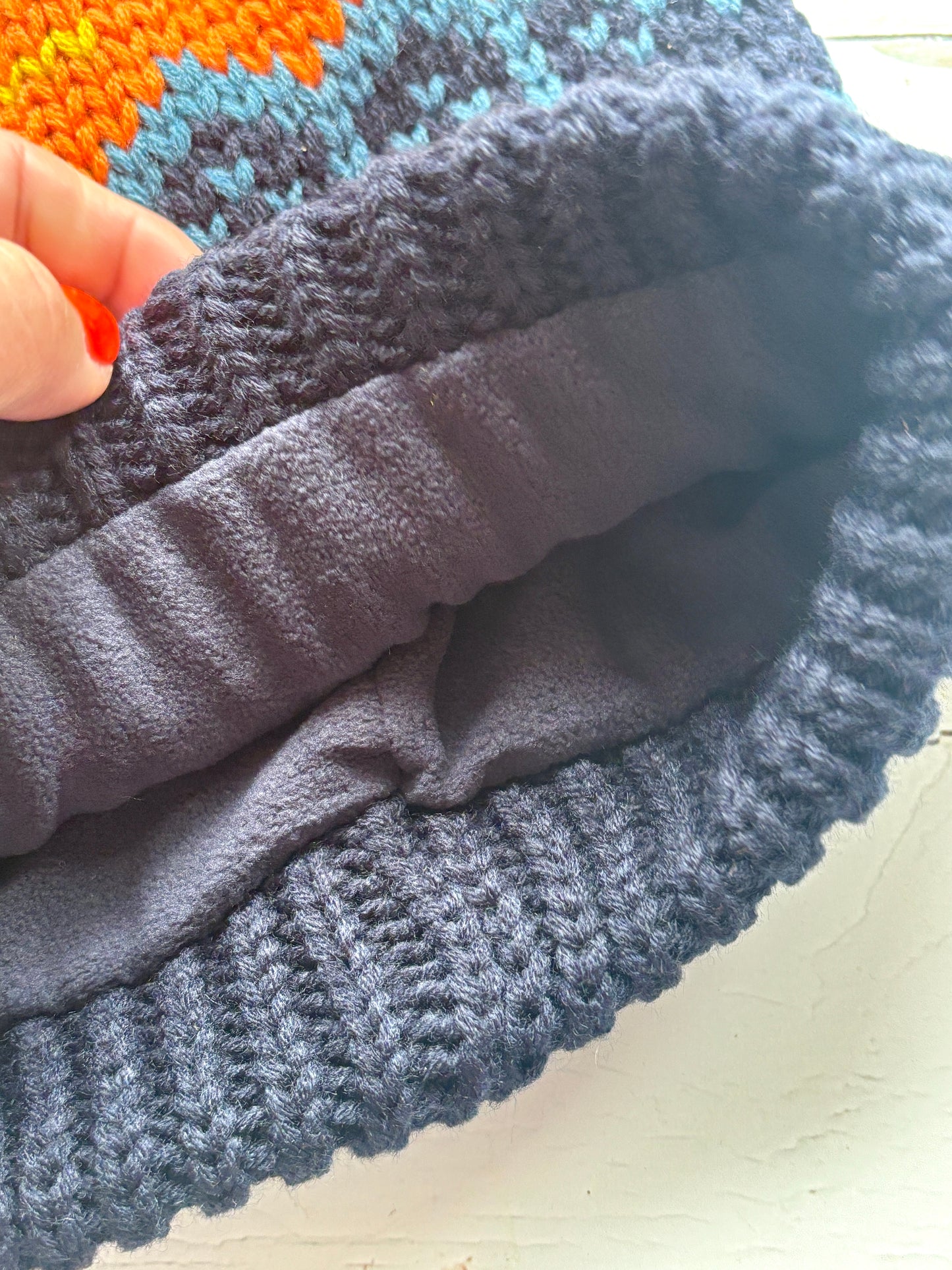 retro knit bobble hat with fleece lining and bold zigzag pattern—ultra-warm winter essential for beachside comfort and style