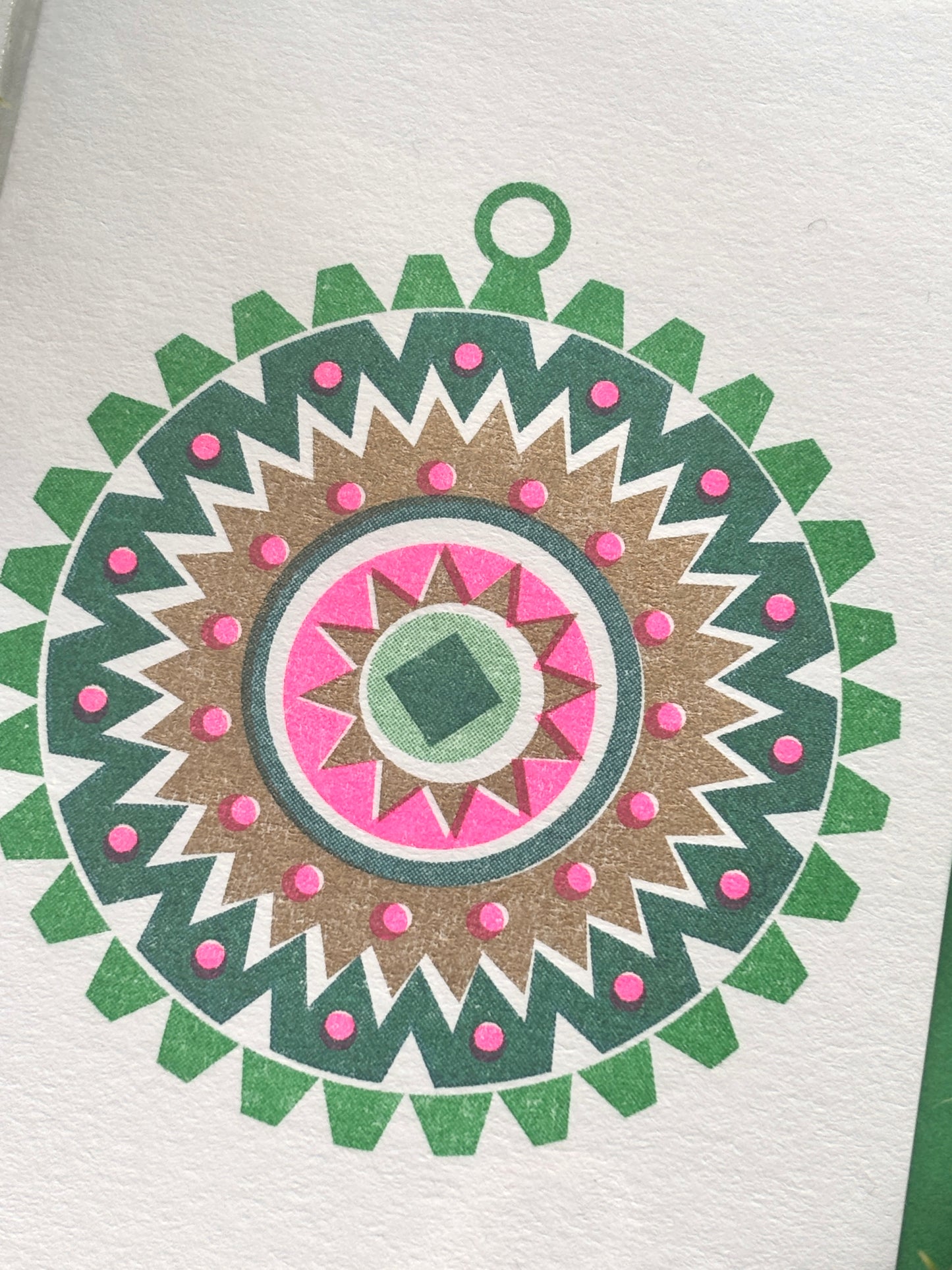 retro-style bauble card—vibrant geometric ornament in pink, green, and gold, perfect for vintage Christmas decor and festive gifting