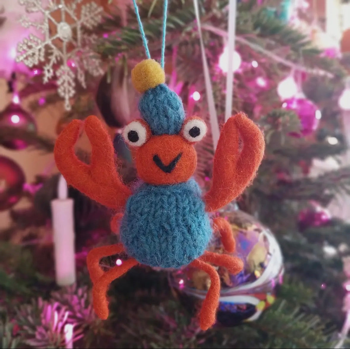 hand-felted crab ornament with knit hat on Christmas tree, whimsical coastal holiday decor for festive styling