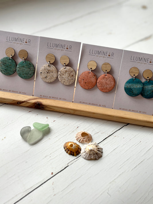 sterling silver stud earrings with wood top handmade sand-texture resin in cream, peach, and teal coastal, modern jewelry