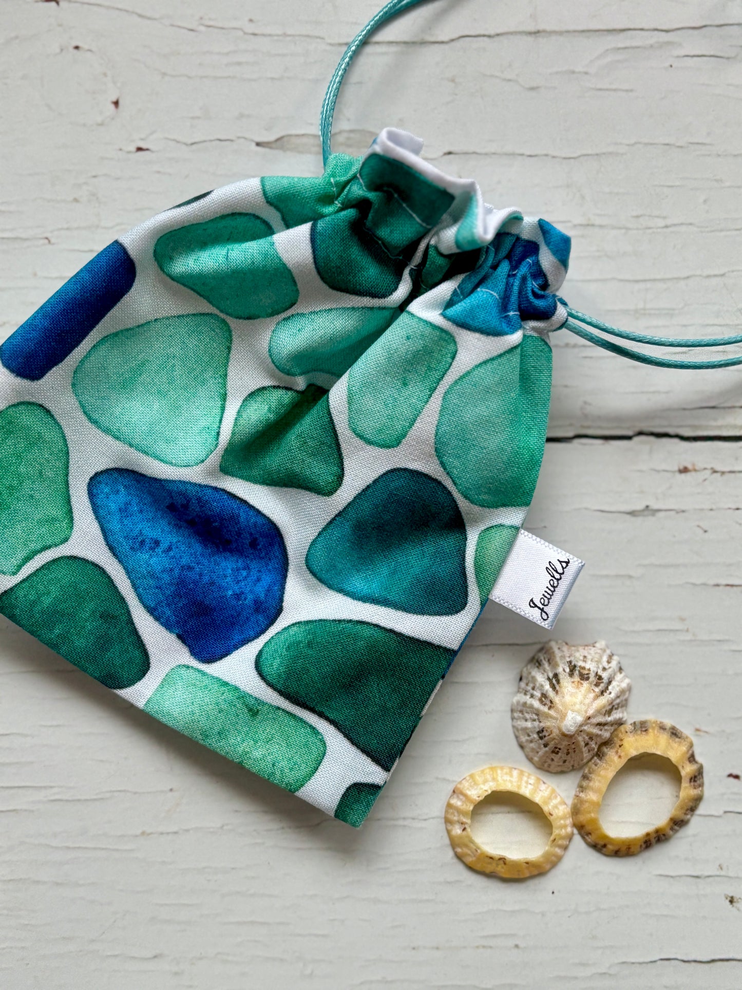 sea glass print drawstring pouch with turquoise cord, coastal-themed fabric bag for jewelry or keepsakes
