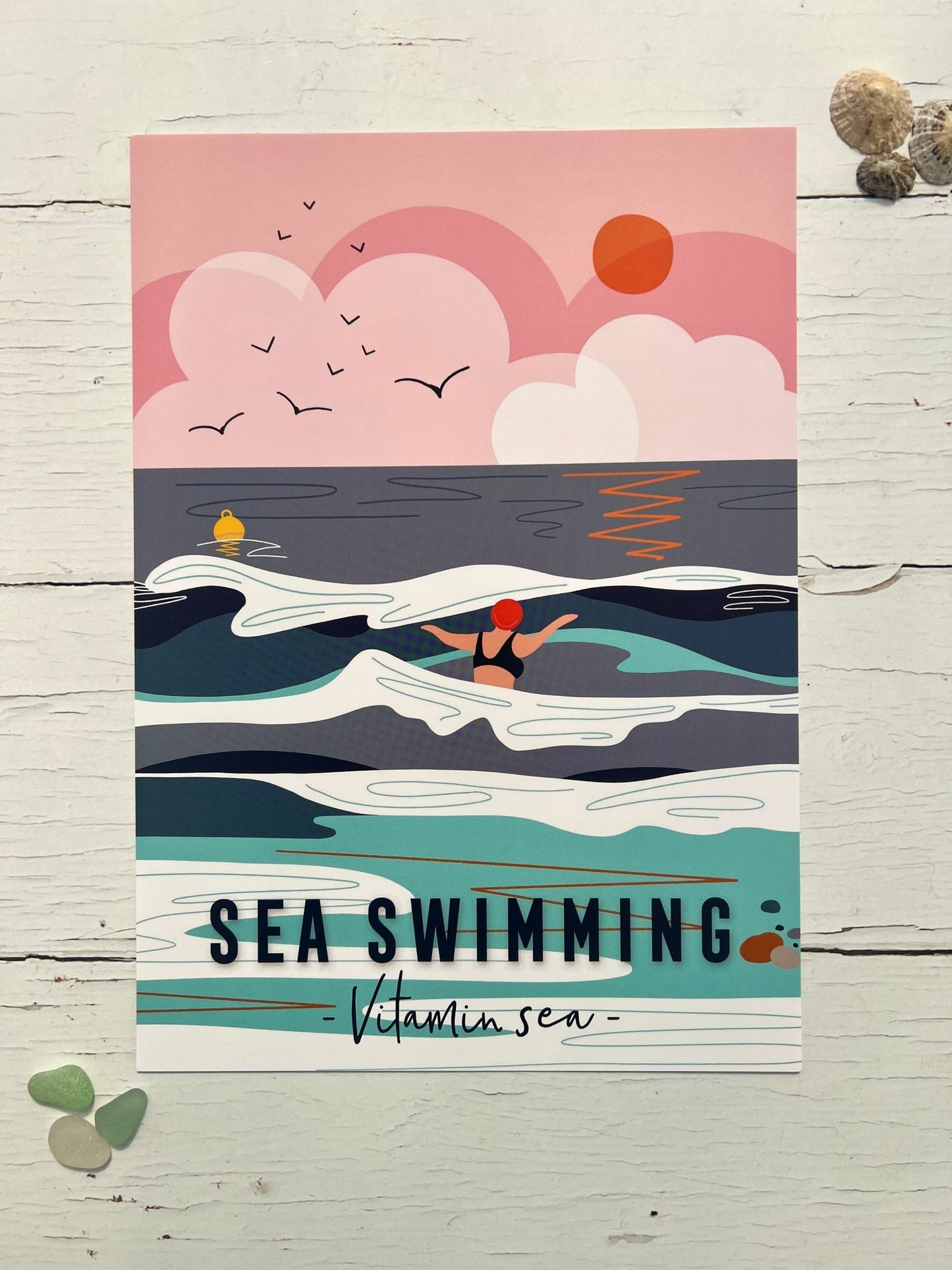 colorful A4 sea swimming art print with sunset, swimmer, and “Vitamin Sea” coastal wellness theme