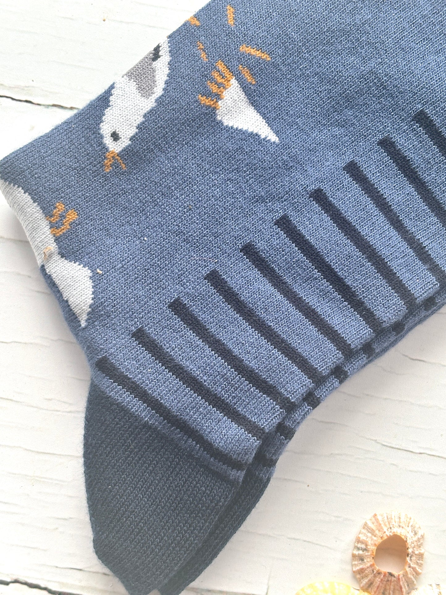 seagull bamboo socks—quirky fries and gulls print with black cuff detail on soft blue knit, ideal for coastal style and eco gifting