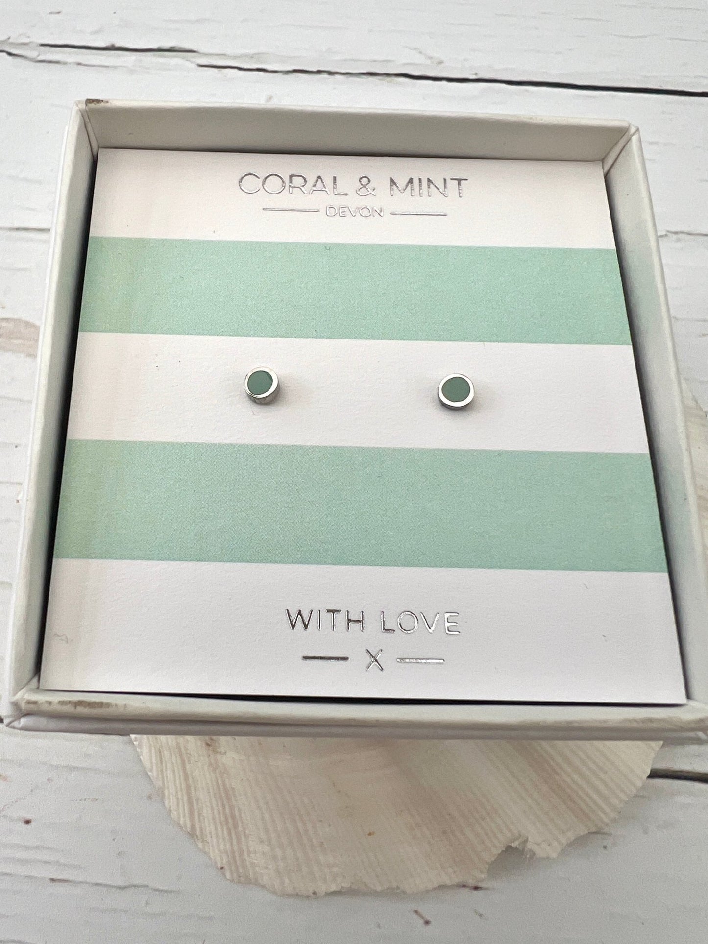 mini mint enamel dot stud earrings by Coral & Mint dainty silver jewelry on a striped gift card minimalist gift idea
