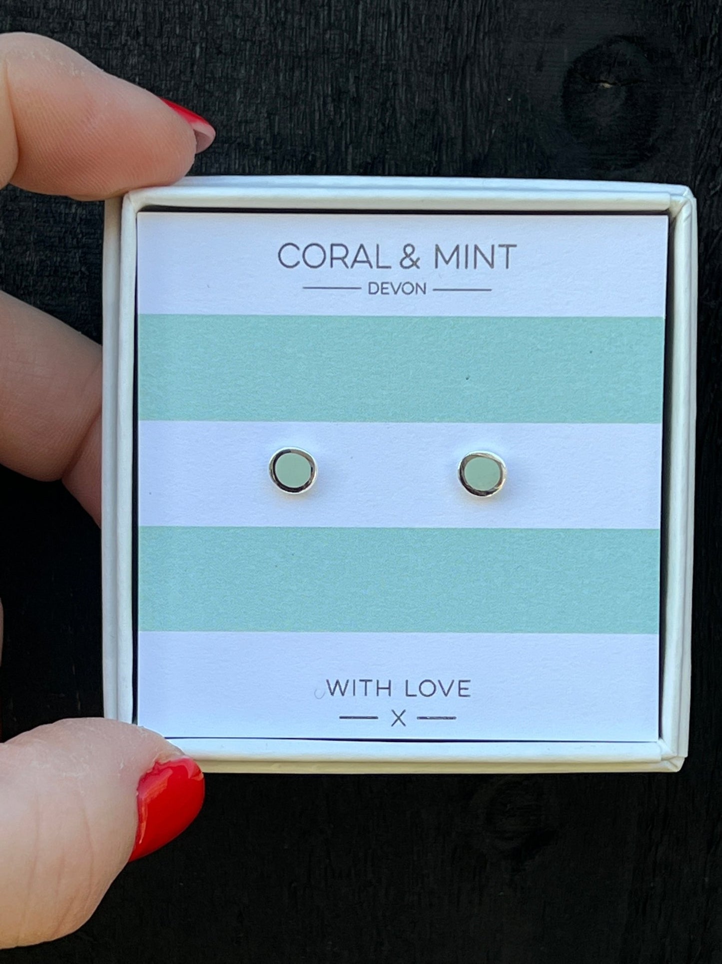 mint green enamel dot stud earrings by Coral & Mint minimalist silver jewelry on a striped gift card dainty gift idea