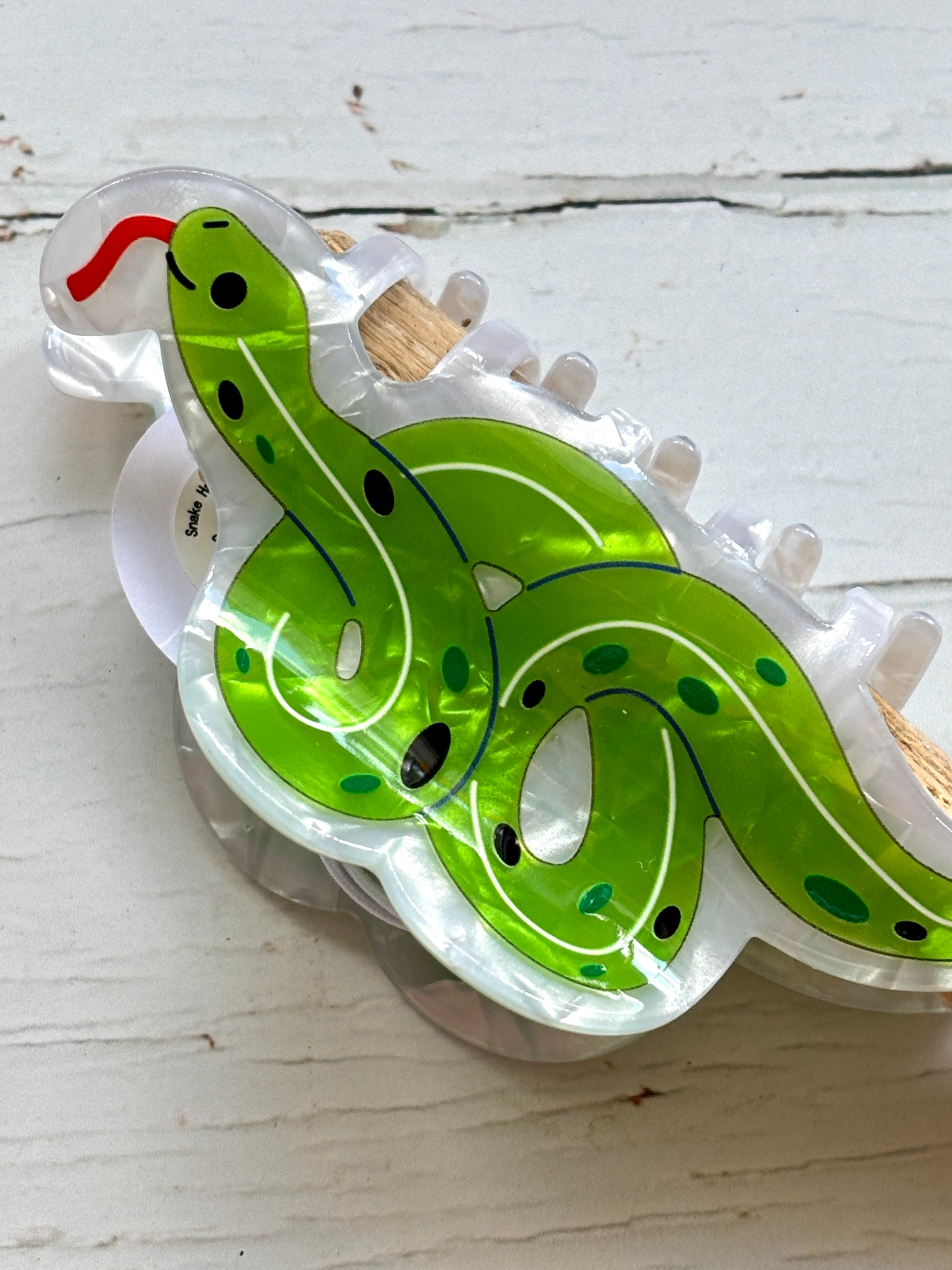 green snake hair claw—transparent clip with cartoon charm, secure grip, and bold animal-inspired everyday style