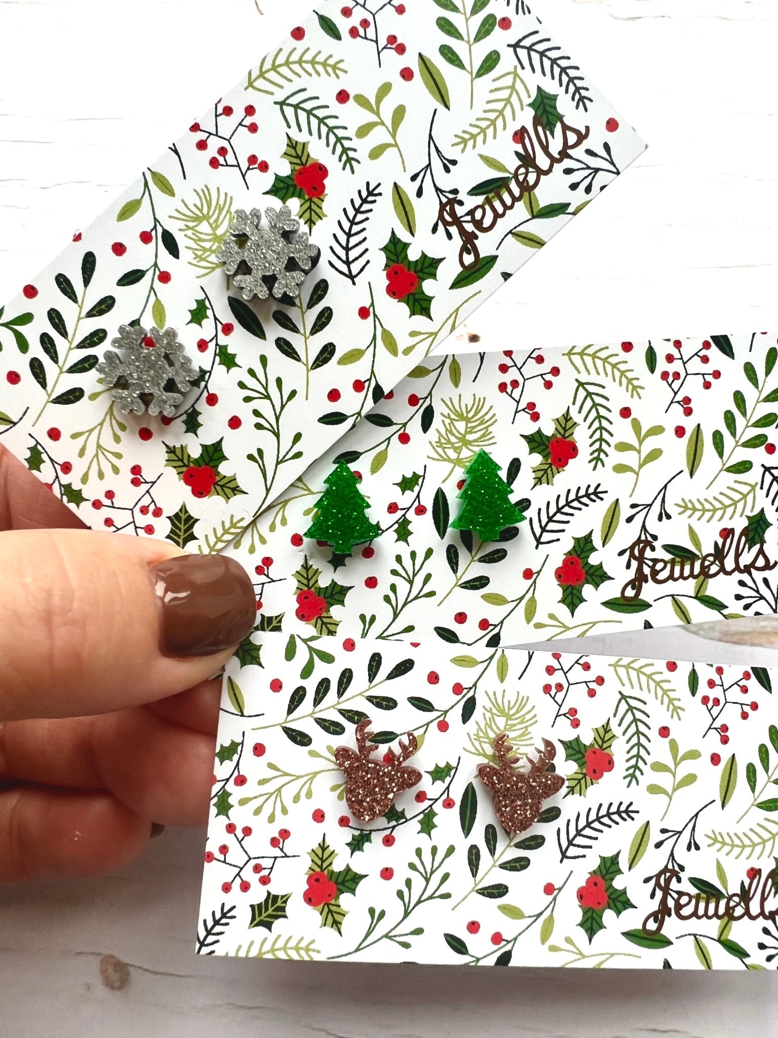 festive snowflake stud earrings in silver glitter—perfect for Christmas outfits and holiday sparkle