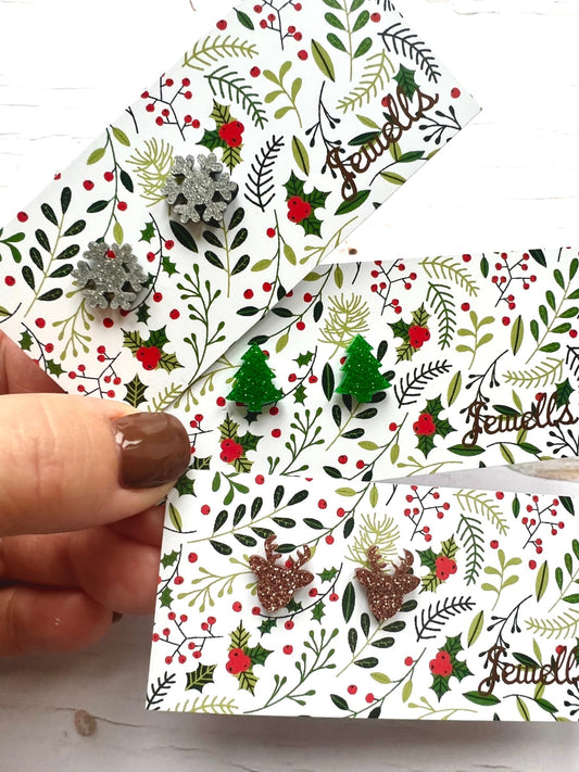 festive snowflake stud earrings in silver glitter—perfect for Christmas outfits and holiday sparkle