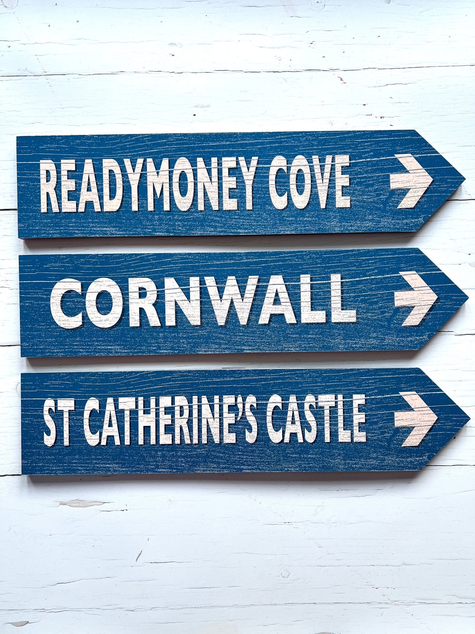 coastal-themed set of 3 blue arrow signs—vintage-style wall decor for Cornwall, Readymoney Cove & St Catherine’s Castle