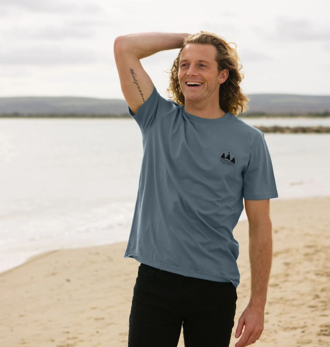 blue men’s tee with Readymoney Cove stamp back print—retro coastal artwork styled for beachwear, travel, and relaxed outdoor living