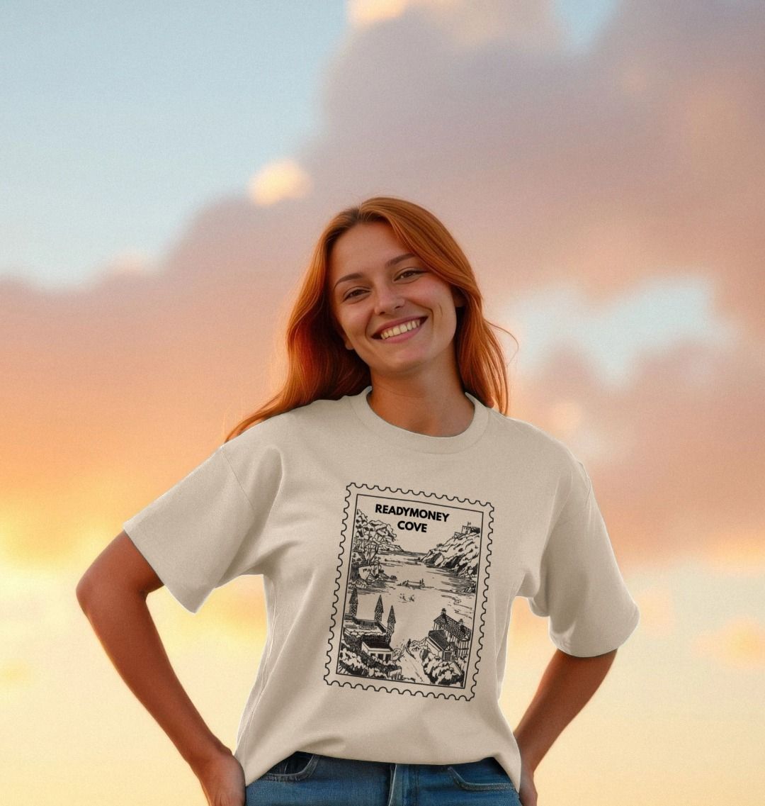 oat oversized women’s tee with Readymoney Cove stamp print—soft cotton, coastal scene, perfect for sunset strolls and travel