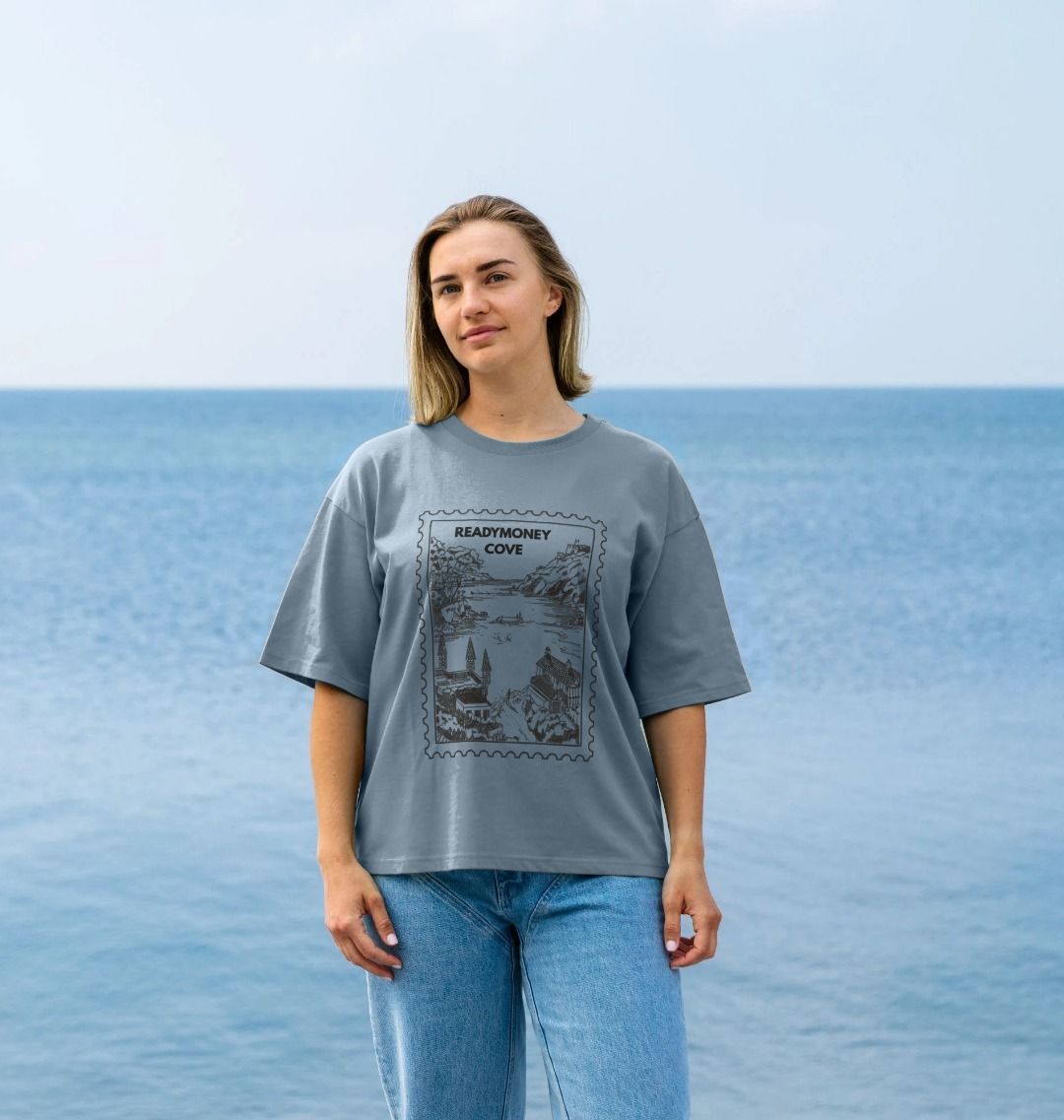 stone blue oversized women’s tee with Readymoney Cove stamp graphic—soft cotton, coastal print, relaxed fit for everyday wear