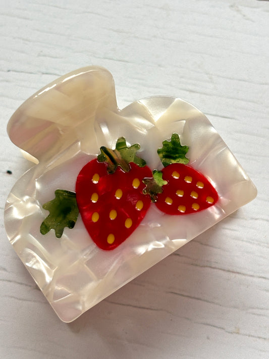 strawberries & cream hair claw—pearlescent clip with red berry accents, textured finish, and secure grip for sweet styling