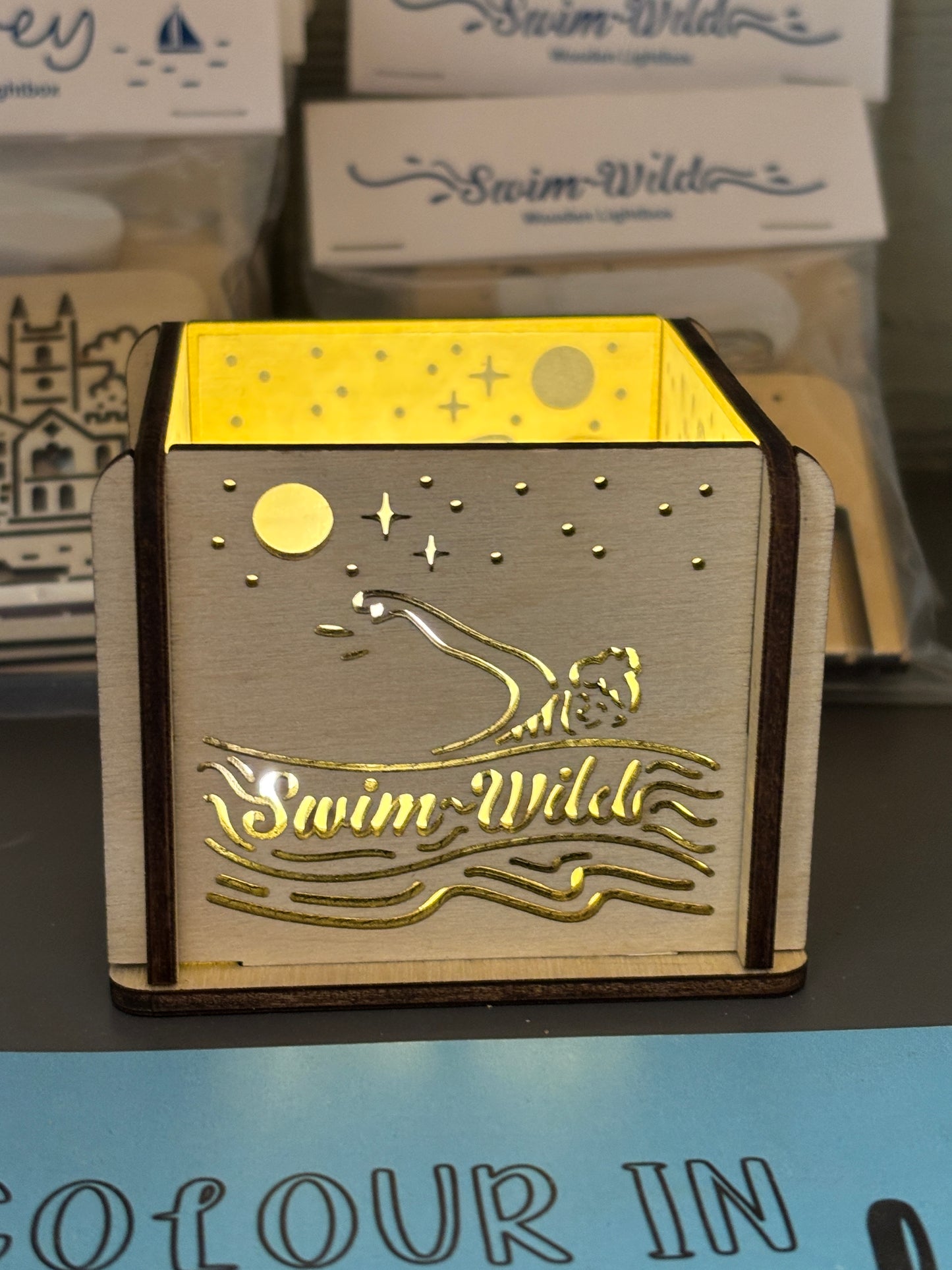 swim wild wooden lightbox—handcrafted coastal decor with swimmer silhouette and starry night glow for nature lovers