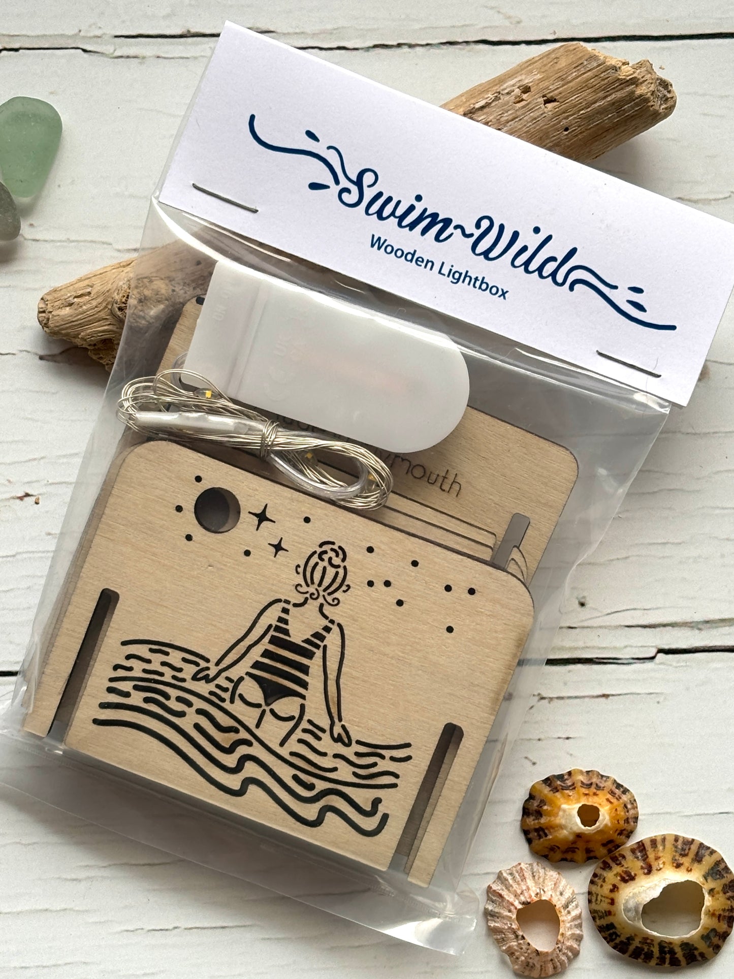 swim wild wooden lightbox kit—DIY coastal decor with swimmer design, perfect for wild swim lovers and festive gifting