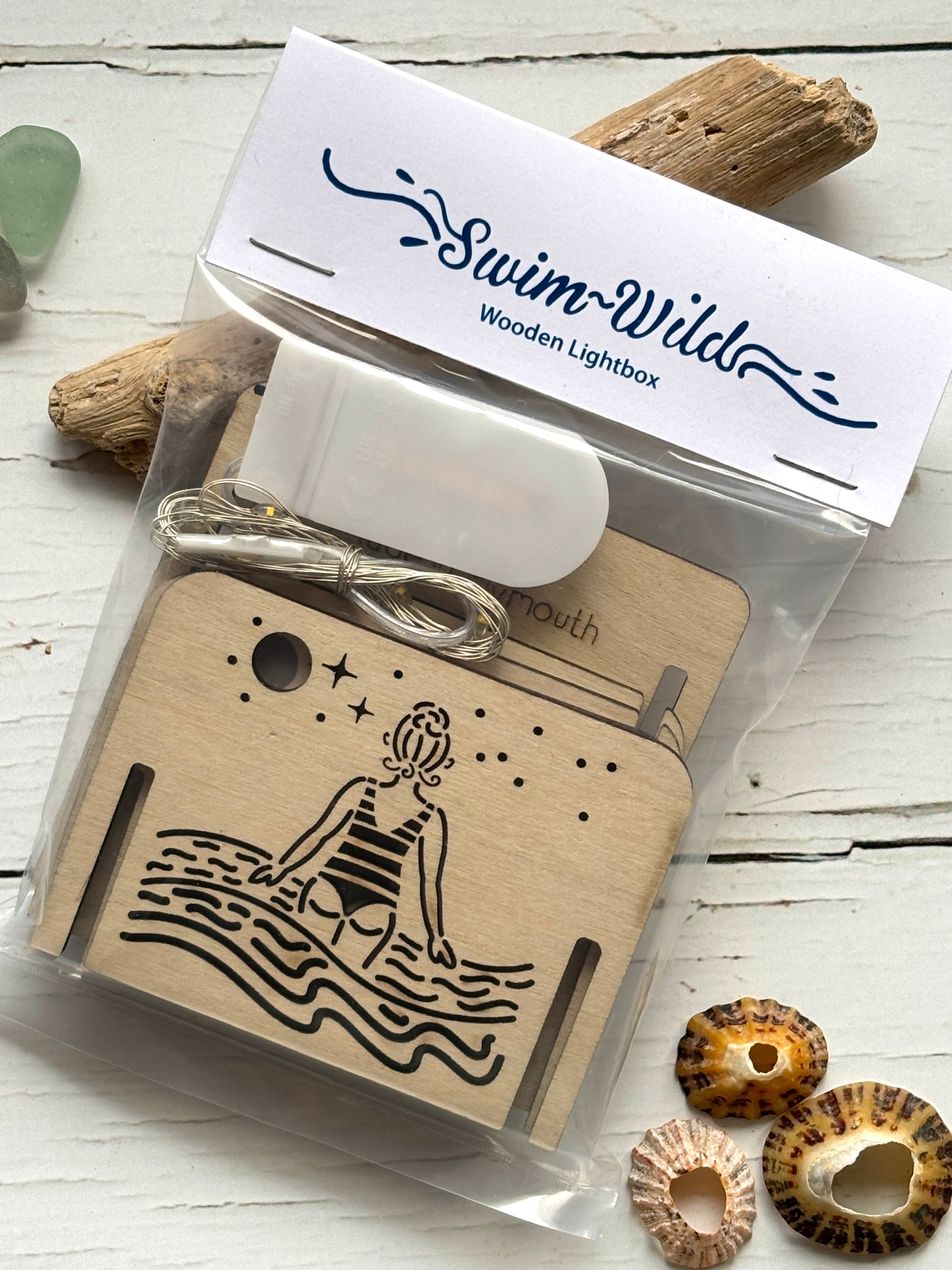 swim wild wooden lightbox kit—DIY coastal decor with swimmer design, perfect for wild swim lovers and festive gifting