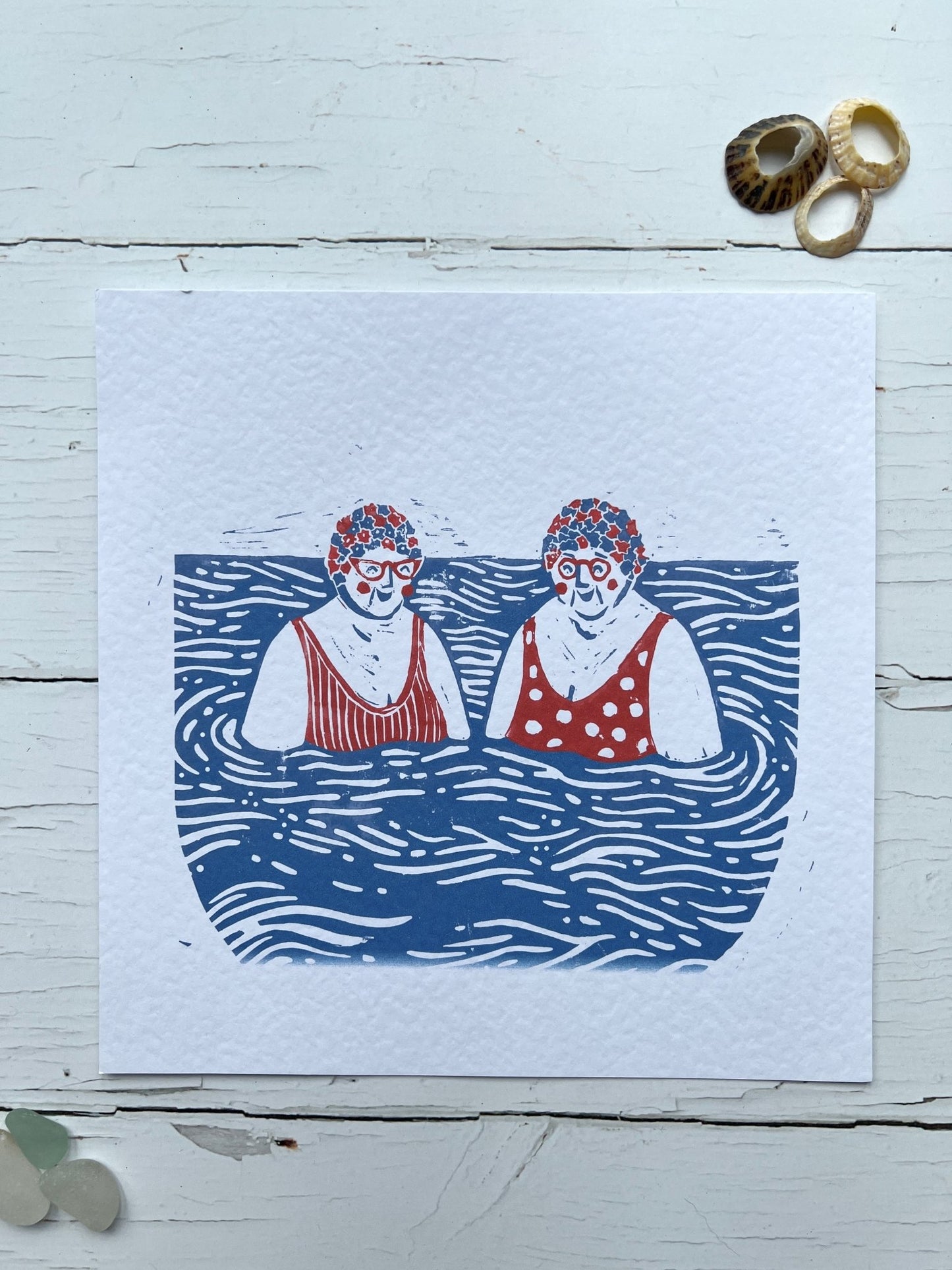 swimming ladies art print—retro coastal wall decor with bold red swimsuits, perfect for wild swim lovers and festive gifting