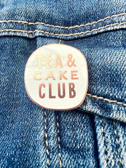 Tea & Cake Club enamel pin—quirky metallic badge for food lovers, perfect for gifting and cozy denim styling