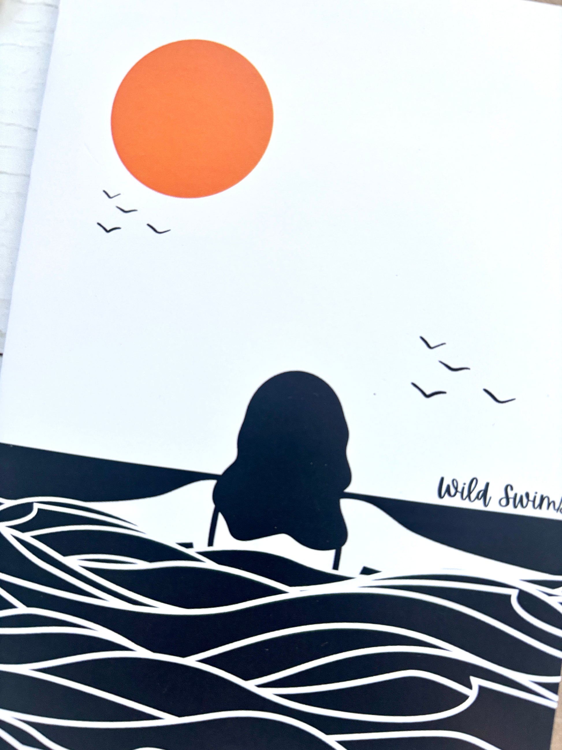 swimmer under sun closeup card, minimalist black and white waves, orange circle sun, birds in flight, wild swimming