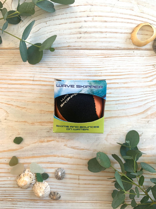 wave skipper ball skims bounces water orange black beach pool toy outdoor water sports summer fun kids ages 5+ gift