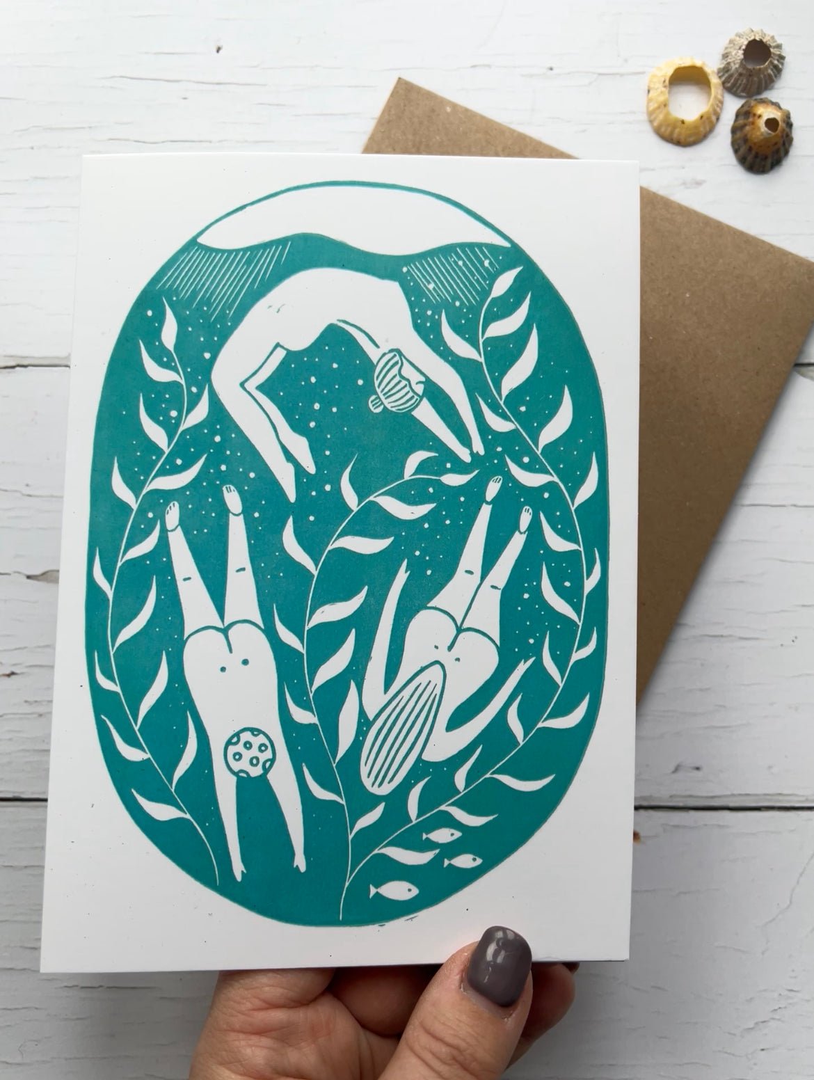 underwater swimmers greeting card with teal sea scene, minimalist design, and serene ocean-inspired illustration