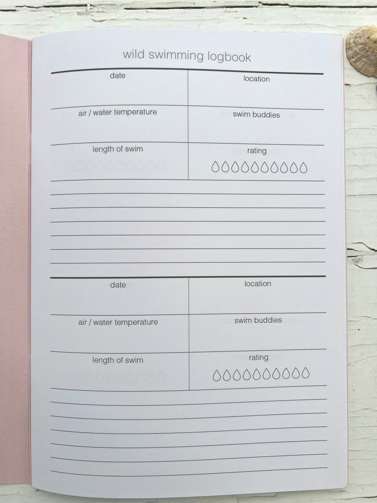 wild swimming logbook page with swim tracker template—record dates, temps, buddies, and notes