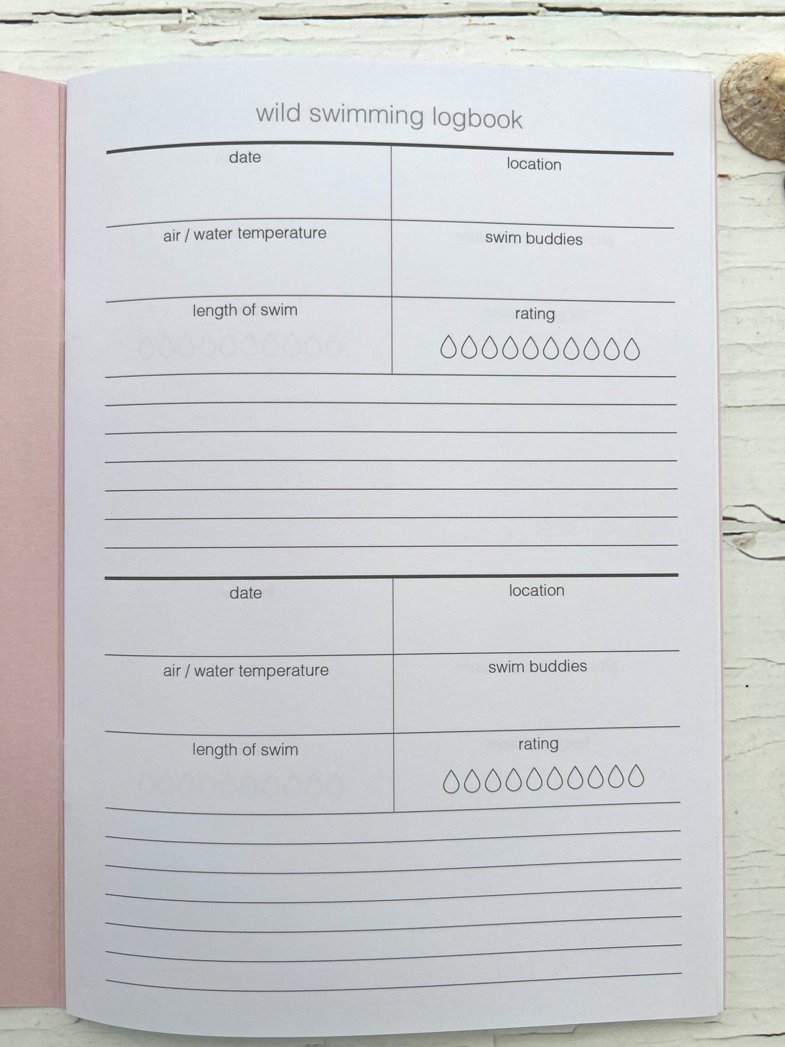 wild swimming logbook page with swim tracker template—record dates, temps, buddies, and notes