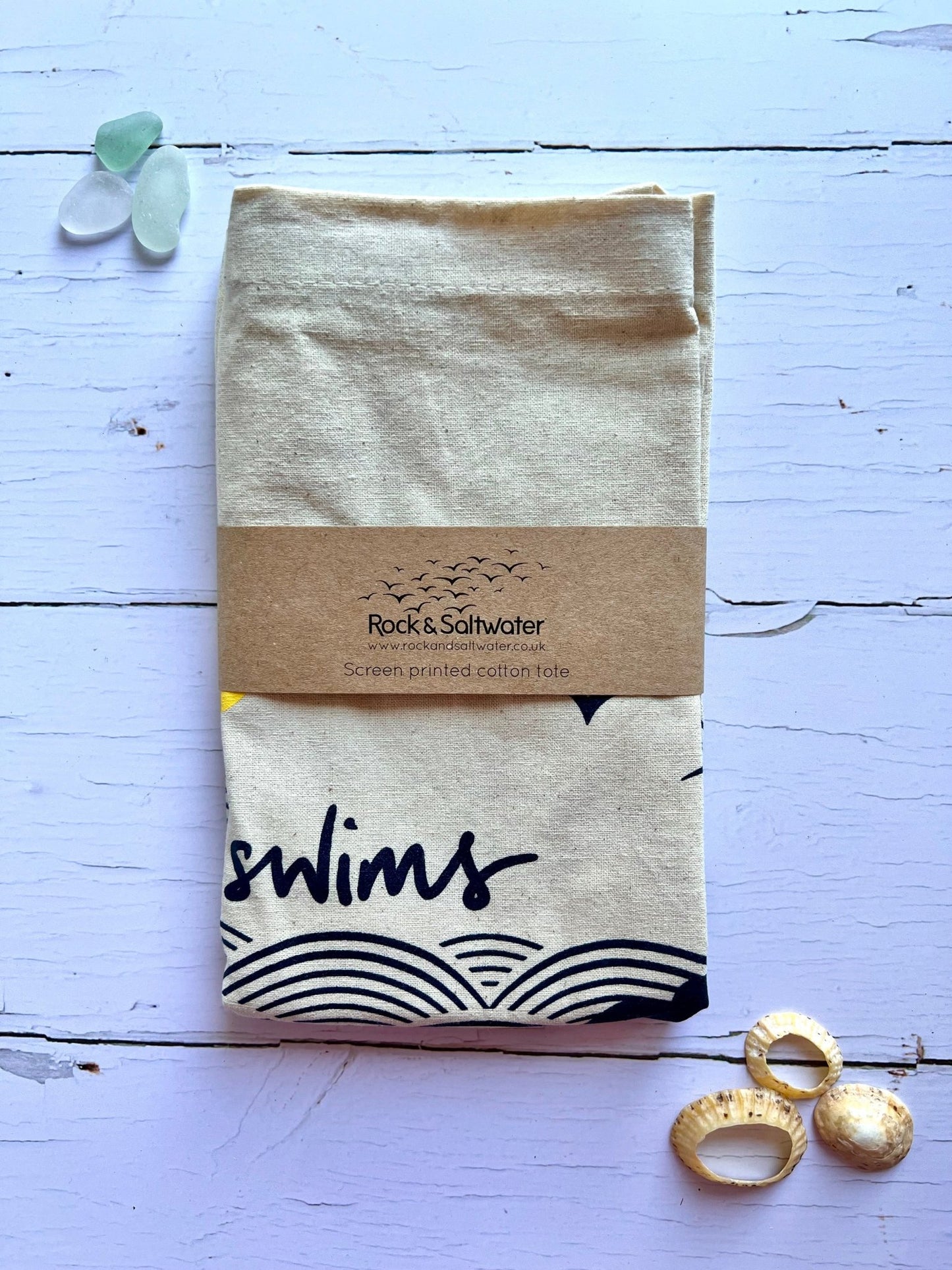 beige cotton tote bag with wild swim print—eco-friendly coastal accessory for ocean lovers and swimmers