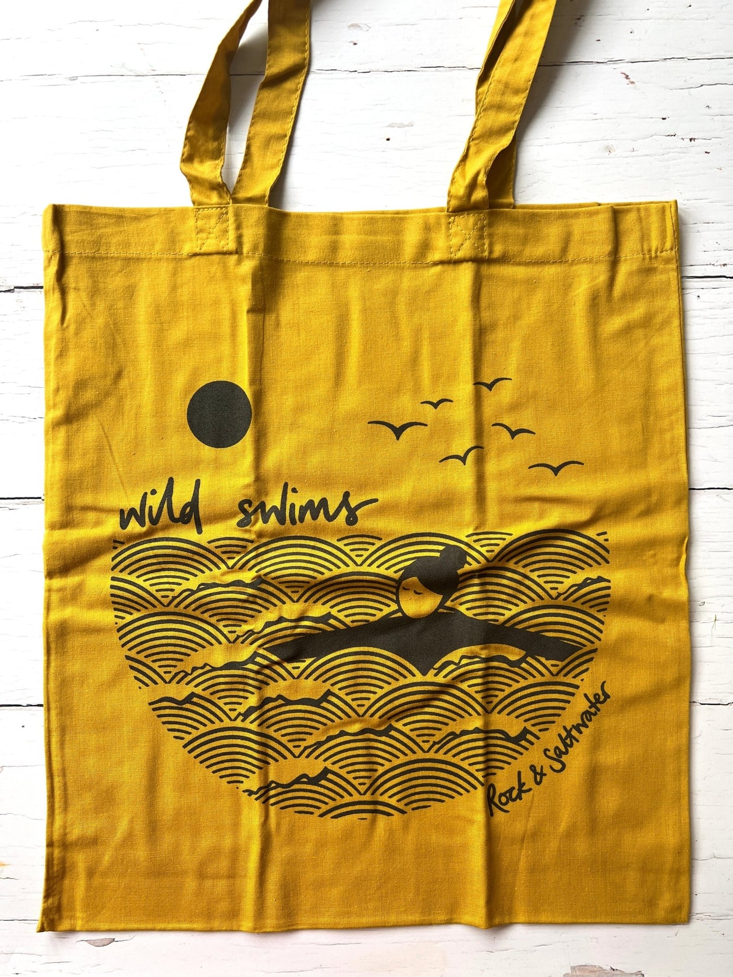 mustard cotton tote bag with wild swim design—stylish coastal accessory for ocean lovers and swimmers