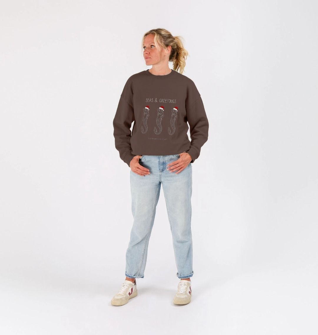 women's oversized Christmas sweatshirt—chocolate with Santa seahorses, “Seas & Greetings” ocean holiday design