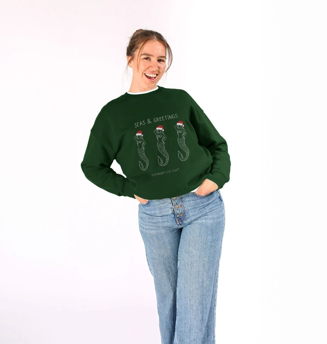 women's festive oversized sweatshirt—three Santa seahorses, “Seas & Greetings” marine Christmas graphic