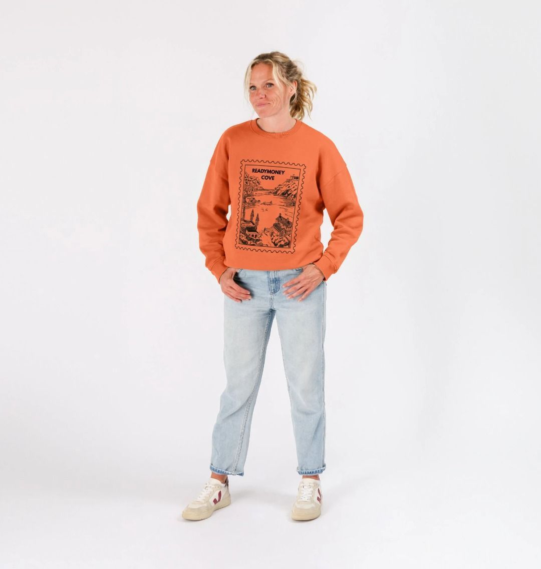 apricot oversized sweatshirt with Redmoney Cove print—retro mountain style and relaxed, boxy comfort