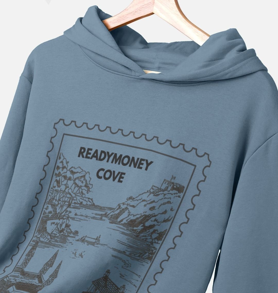 closeup shot of stone blue oversized hoodie – coastal pullover with Readymoney Cove stamp detail, soft sweatshirt for travel days