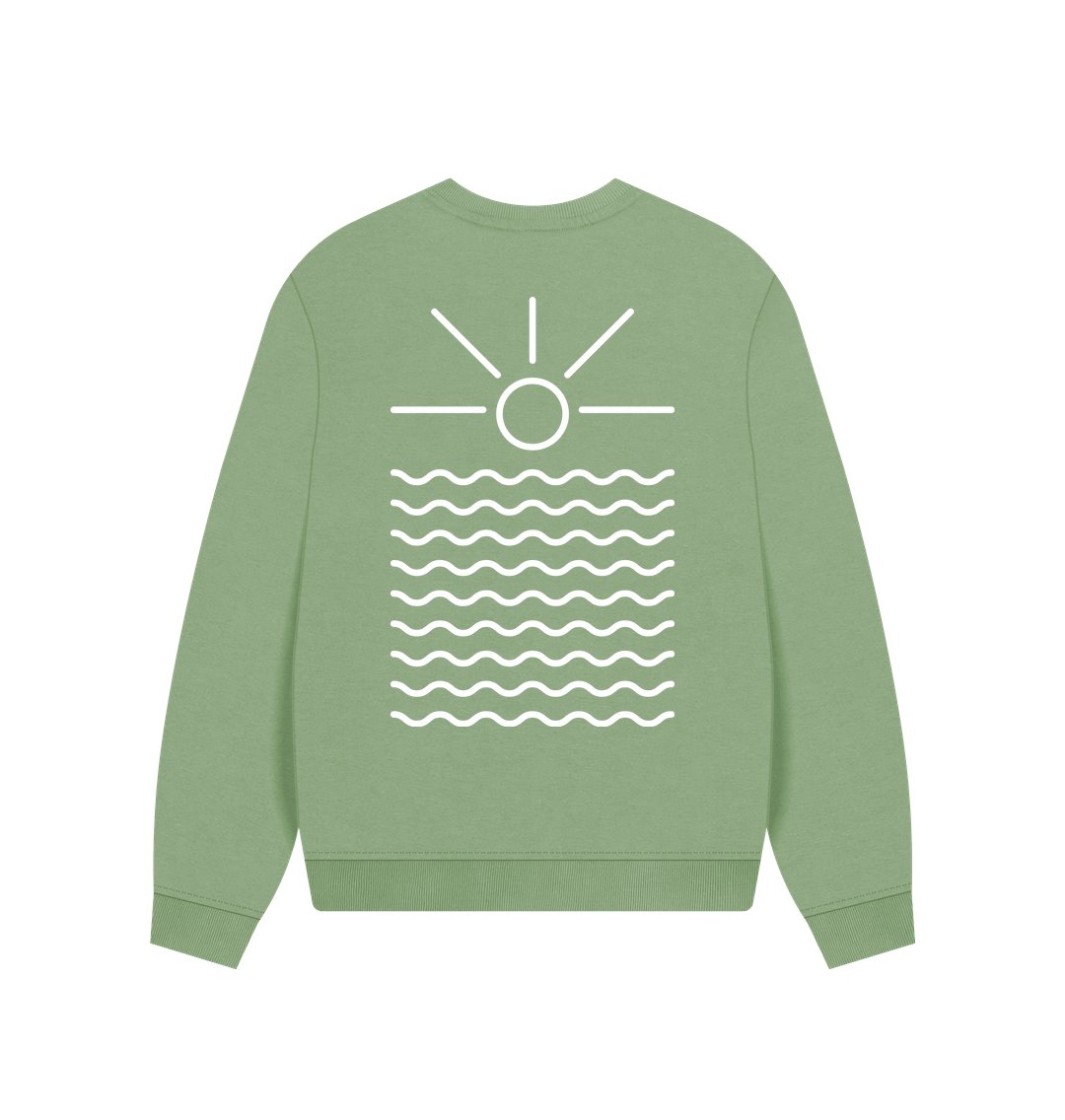 sage oversized sweatshirt—sunrise and wave back print, relaxed coastal adventure aesthetic