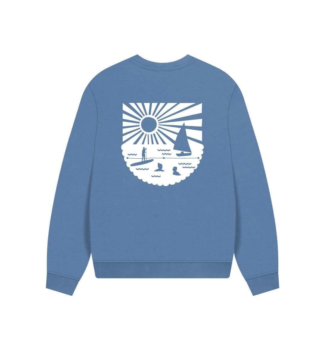 river blue oversized women's sweatshirt with minimalist white chest logo—organic cotton, relaxed coastal style.