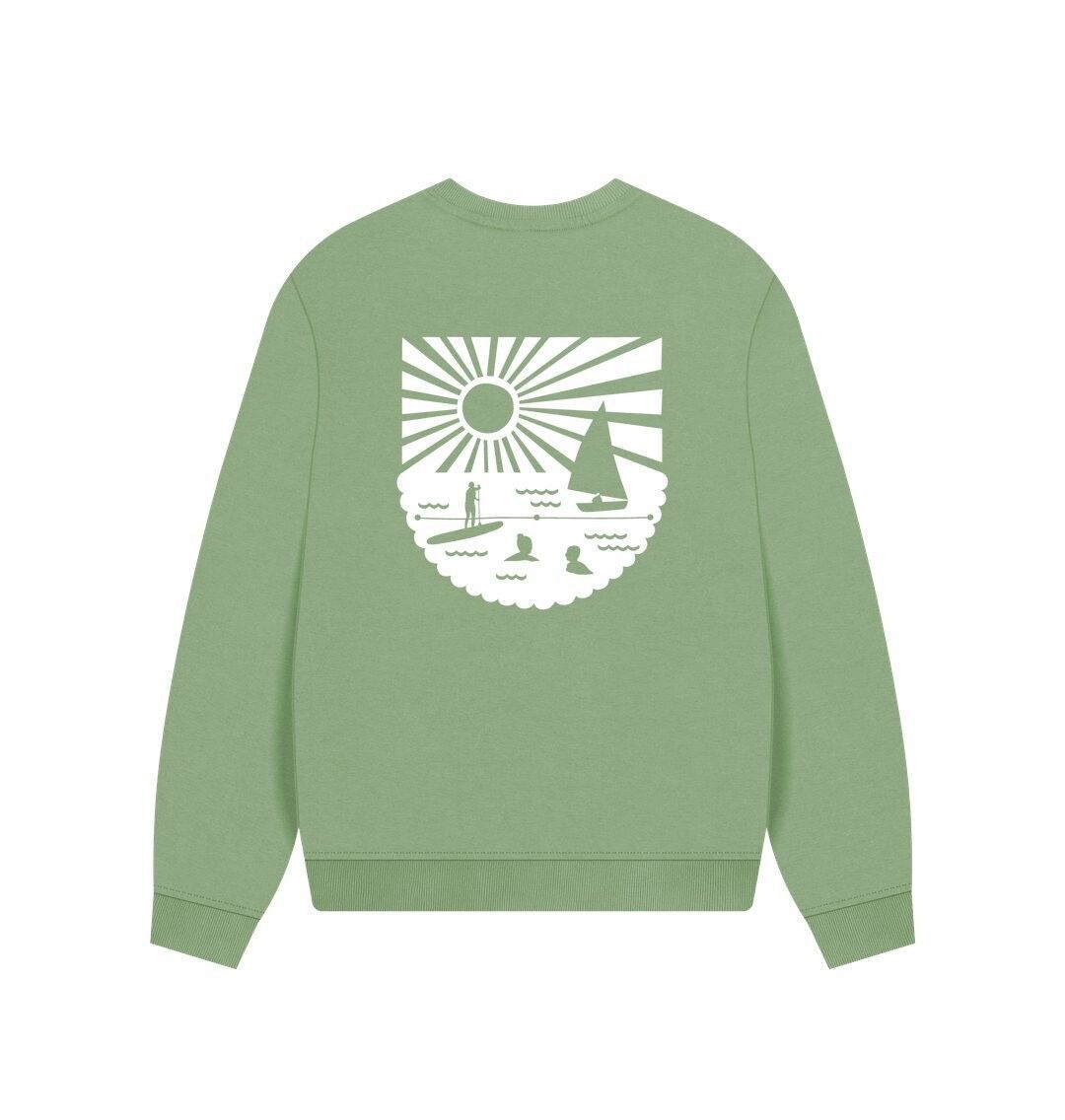 sage green oversized women's sweatshirt with bold white coastal graphic—relaxed fit for beach-inspired layering