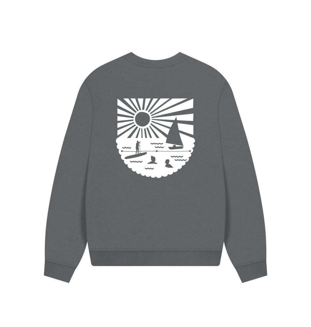 slate grey oversized women's sweatshirt with bold white coastal graphic—relaxed fit for beach-inspired layering
