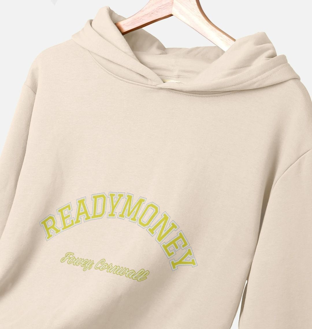 closeup shot of oat women's relaxed-fit hoodie with varsity arch text, Readymoney Cove Fowey Cornwall print