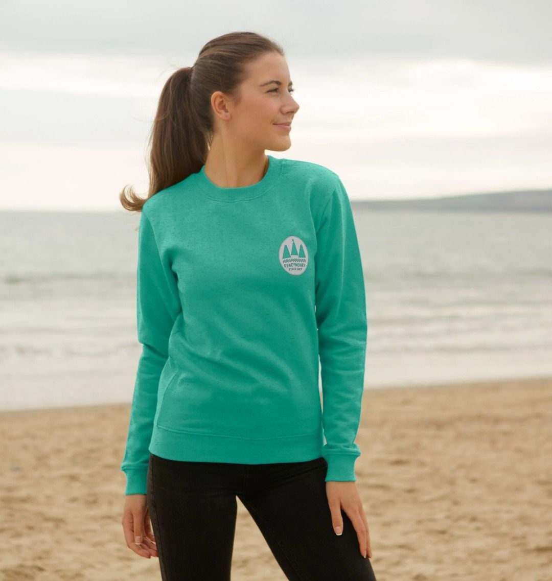 seagrass green oversized women's sweatshirt with white chest logo—organic cotton, beach-ready relaxed fit