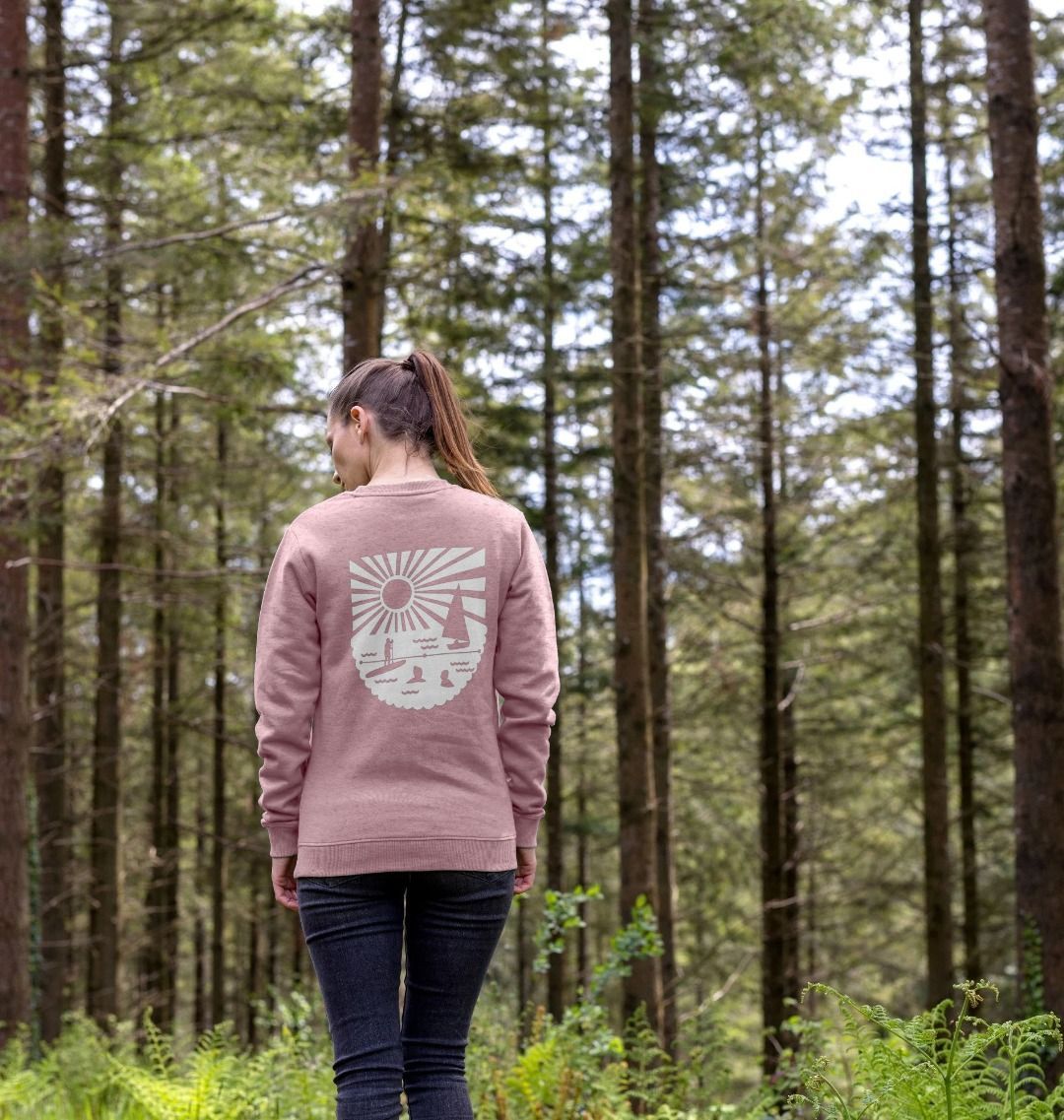 sunset pink oversized women's sweatshirt with bold white coastal graphic—relaxed fit for nature-inspired layering