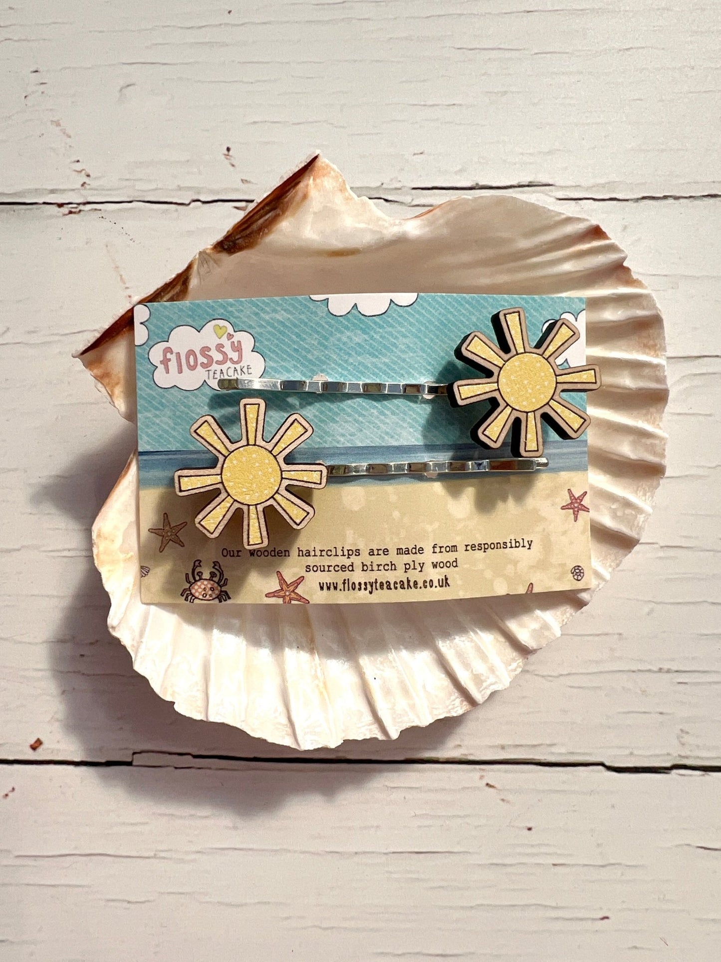 yellow sunshine wooden hairgrips made from birch ply, eco-friendly coastal accessories for playful summer styling