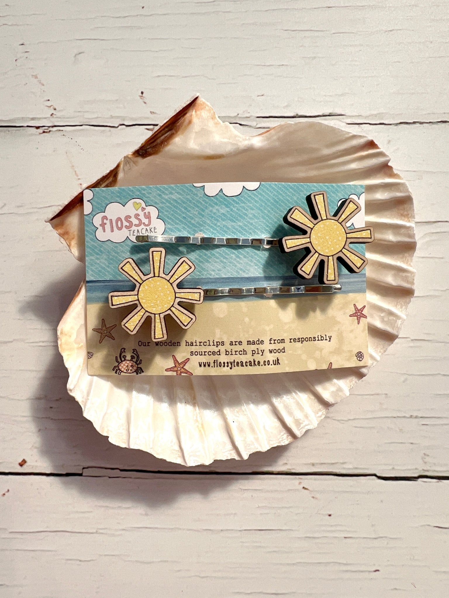 yellow sunshine wooden hairgrips made from birch ply, eco-friendly coastal accessories for playful summer styling